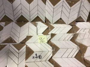 lot 96 image: Mapleton White 7 in. x 12 in. x 10 mm Chevron Honed Marble Wall and Floor Mosaic Tile by Jeff Lewis
