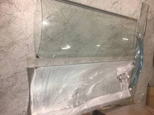 lot 101 image: 38 in. x 72 in. Frameless Corner Sliding Shower Door only in Stainless Steel by Delta in good conditions