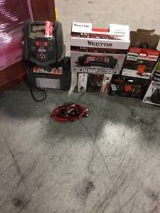 lot 110 image: Lot with Assorted Jumpers Boxes and chargers costumers returns