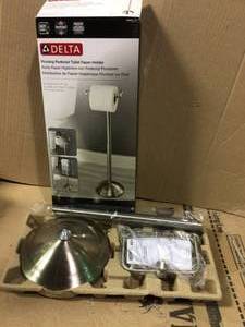lot 11 image: Greenwich Telescoping Pivoting Free-Standing Toilet Paper Holder in SpotShield Brushed Nickel by Delta in good conditions 