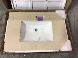 lot 30 image: Home Decorators Collection 31 in. W Engineered Marble Single Vanity Top in Champ not used