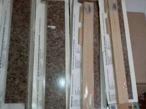 5-14 in. x 25-14 in. Laminate Endsplash Kit in Milano Brown with Tempo Edge and 5-516 in. 25-14 in. Laminate Endcap Kit in Milano Brown with Tempo Edge by Hampton Bay- not used, 4 of each