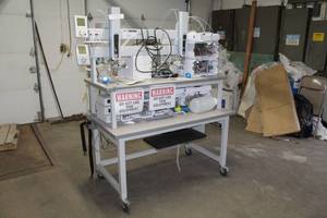 lot 33 image: Thermo Fisher Scientific 2306LX15K with Workplace Systems Modular Bench Systems Laminate Top Metal Rolling Workstation