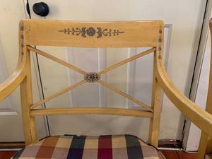 Two Caned Seat Chairs with plaid cushions