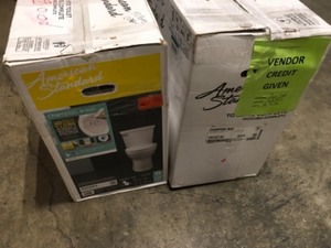 Pallet with 2 American Std Toilets see pictures