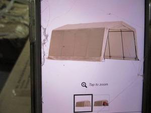 lot 65 image: Truett 10 x 20 Instant Storage Gara...
