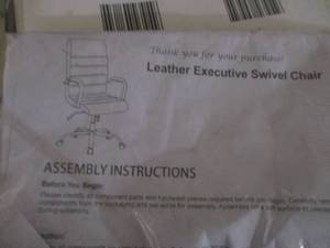 lot 81 image: White Leather Exclusive Swivel Chai...