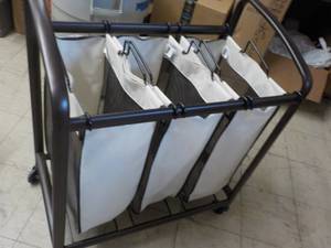 lot 1 image: Clothes Sorter on Wheels 31 x 17 x ...