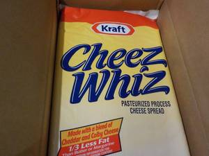 lot 54 image: 6.5 lb. Bag Kraft Cheez Whiz best ...