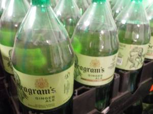 lot 211 image: 8 -2 Liter Bottles of Seagrams Caf...