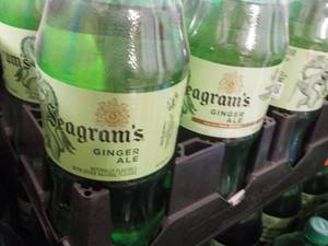 lot 212 image: 8 -2 Liter Bottles of Seagrams Caf...