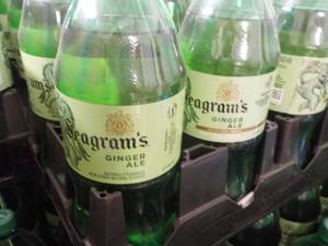 lot 213 image: 8 -2 Liter Bottles of Seagrams Caf...
