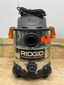 lot 32 image: RIDGID 10 Gal. 6.0-Peak HP Stainless Steel WetDry Shop Vacuum with Filter, Hose and Accessories