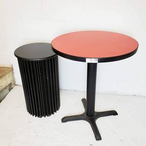 lot 087 image: Round Red Linoleum Cocktail Table