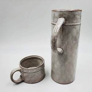 lot 189 image: Ceramic Stonewear Pitcher and Mug Set -Valued  $150