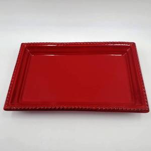 lot 203 image: Ceramic and Glass Serving Bundle This lot includes Red Ceramic serving tray, Two small glass trays Porcelain soap dish