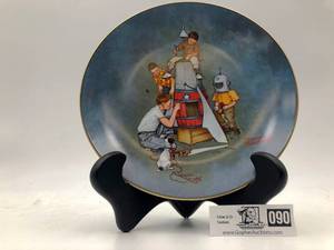 lot 090 image: Norman Rockwell Space Pioneers (Valued  $35)