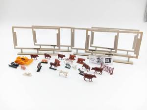 lot 081 image: Vintage Naegele Sign Company Sign Holders and Toy Farm Animals