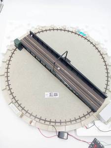 lot 082 image: Vintage Atlas Motorized O Scale Turntable Train Track and Bridge