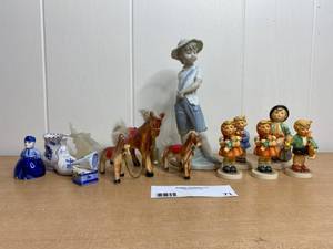lot 71 image: Vintage Goebel Hummel Figurines, Nao Llardro Figurines and More (Valued $350)