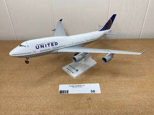 lot 58 image: Vintage Skymarks United Airlines Boeing 747-400 (1200 Scale)