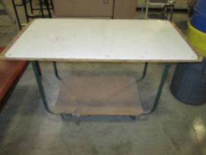 lot 105 image: Work Table On Wheels 48 C 24 C 29...