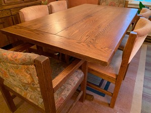 lot 1 image: Conant and Ball Mid Century Oak Dining Room Table and Chairs (Bow Tie)