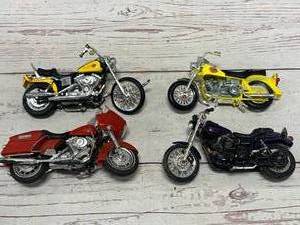 lot 43 image: Lot of 4 Harley Davidson Model Motorcycles