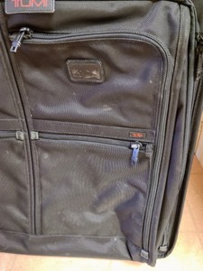 lot 66 image: Large Tumi Suitcase