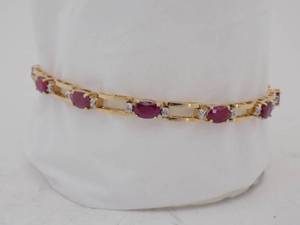 lot 4 image: 14k Yellow Gold Ruby & Diamond Bracelet With 12-4x6 Oval Rubies