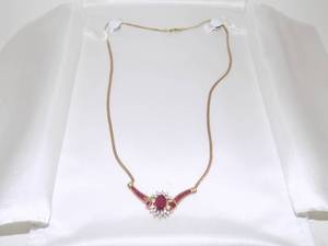 lot 5 image: 14k Yellow Gold Ruby & Diamond Pendant With 6x8mm Oval Ruby