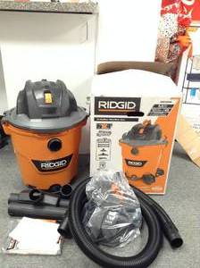 lot 10 image: 12 Gal. 5.0-Peak HP NXT WetDry Shop Vacuum with Filter, Hose and Accessories by RIDGID- slightly dusty not used