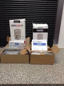 lot 14 image: Powerbolt2 Satin Nickel Single Cylinder Electronic Deadbolt Featuring SmartKey Security by Kwikset - open box not used - mixed