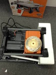 lot 21 image: 6.5 Amp Corded 7 in. Table Top Wet Tile Saw by RIDGID-used