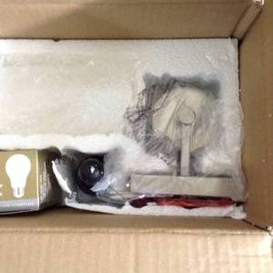 lot 51 image: Hettinger 1-Light Brushed Nickel Sconce with LED Bulb by Sea Gull Lighting- open box not used