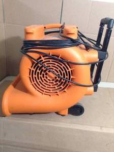 lot 91 image: 1625 CFM Blower Fan Air Mover with Handle and Wheels by RIDGID- slighlty used