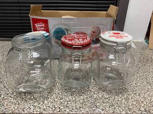 lot 1 image: Cottage Chic 3-Piece Wire Bail and Trigger Closure Glass Jar Set by General Store- one is damged