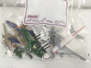 lot 25 image: Bag of Vintage Toy Planes
