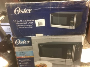 lot 34 image: Oster Microwave