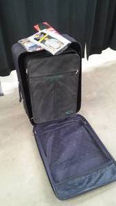 lot 15 image: 2 SUITCASES WITH TEE SHIRTS