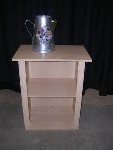 lot 23 image: WOODEN STORAGE SHELF. AND TIN PICTURE