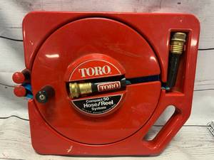 lot 21 image: Vintage 1980s Toro Compact 50 Hose Reel System (sold $42 on ebay)