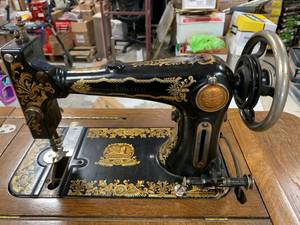 lot 77 image: Antique America Sewing Machine with Egyptian Pattern