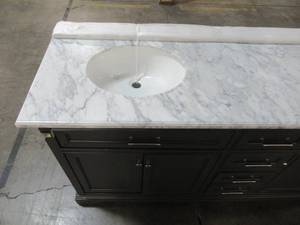 lot 100 image: Home Decorators Collection Windlowe 73 in. W x 22 in. D x 35 in. H Bath Vanity in Gray with Carrara Marble Vanity Top in White with White Sink 15101-VS73C-GR