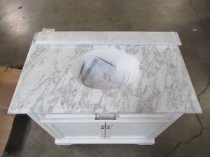 lot 105 image: Home Decorators Collection Windlowe 37 in. W x 22 in. D x 35 in. H Bath Vanity in White with Carrera Marble Vanity Top in White with White Sink 15101-VS37C-WT