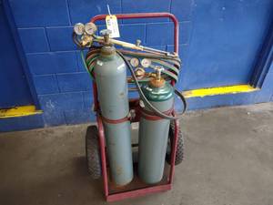 lot 22 image: Torch Set Includes Torch, Gages, Ho...