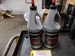 lot 93 image: (2) Quarts 75w90 Full Synthetic Oil...