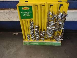 lot 114 image: Hose Clamps & Rack...