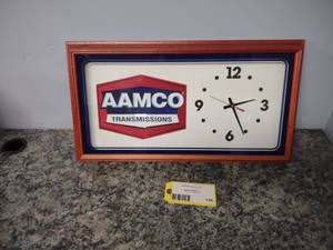 lot 136 image: Aamco Clock...
