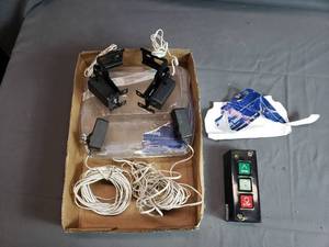 lot 7 image: Garage Door Sensors and Switch
